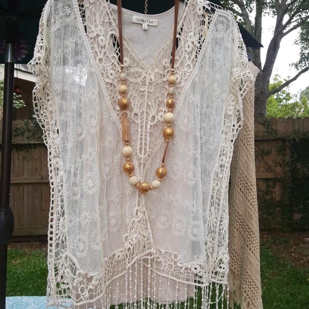 Pretty cream crochet sheer top.
